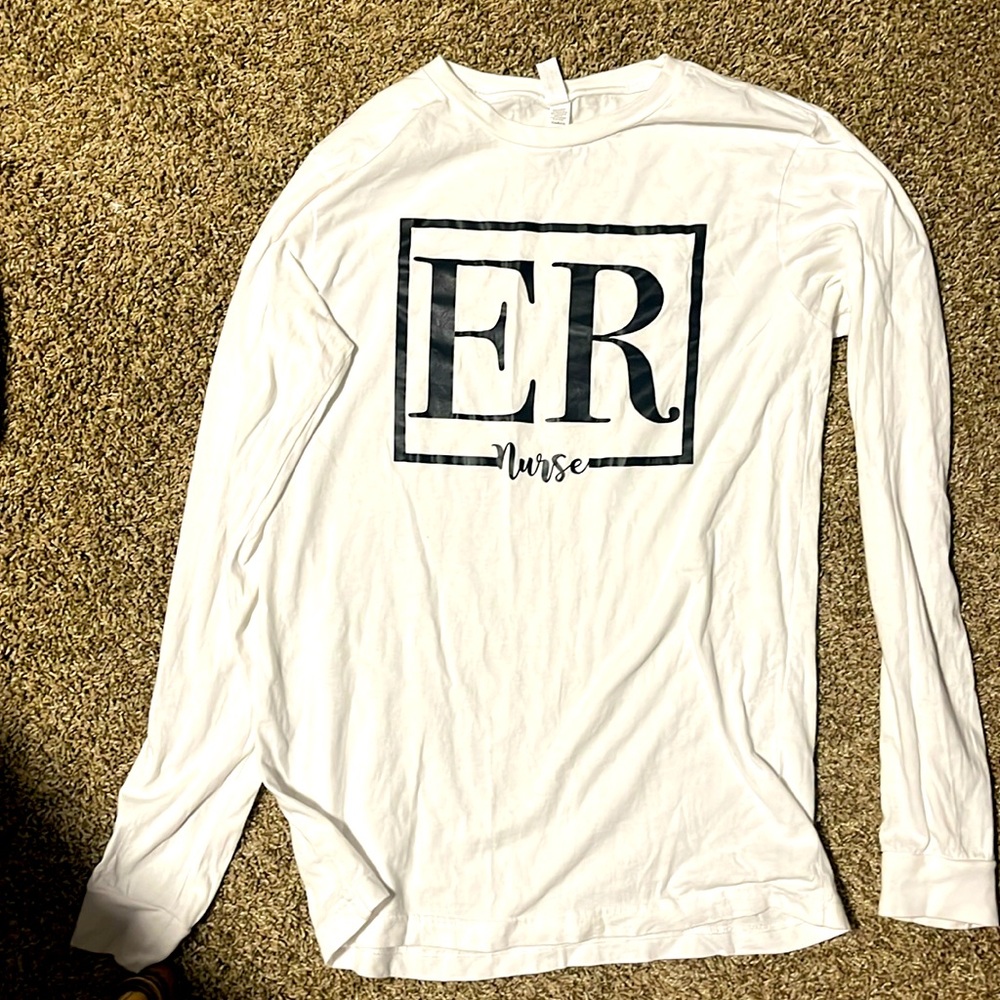 Long sleeve women’s ER Nurse shirt. WORN ONCE !